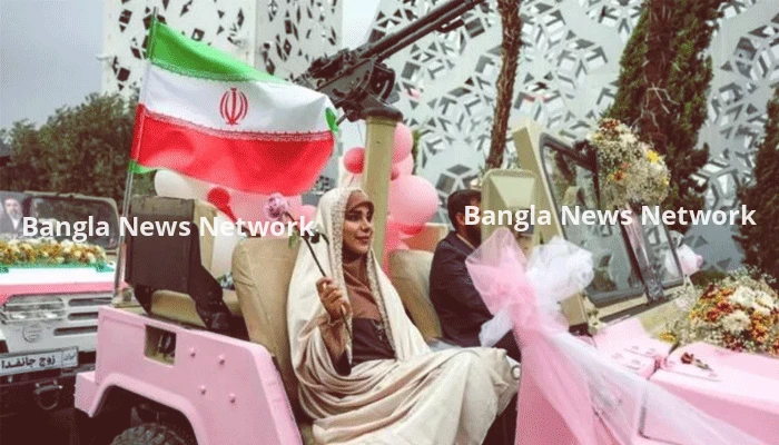 যুদ্ধক্ষেত্রে জীবন দিতে চাওয়া ইরানিদের গণবিয়ে, মেশিনগান নিয়ে হাজির বর-কনে!