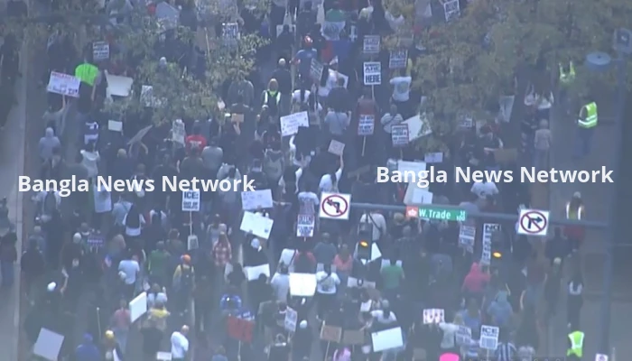 যুক্তরাষ্ট্রের অভিবাসন সংস্থার অভিযানের বিরুদ্ধে ব্যাপক বিক্ষোভ নর্থ ক্যারোলাইনায়